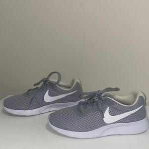Gray Nike running shoes